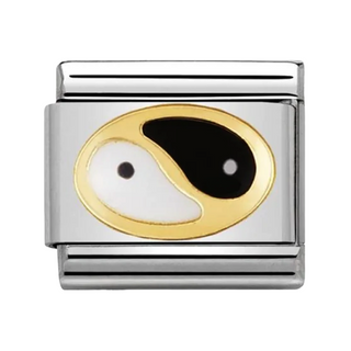 A rectangular silver-toned metal charm link featuring a stylized yin-yang symbol with white and black enamel sections and gold outlines, shown on a plain white background.